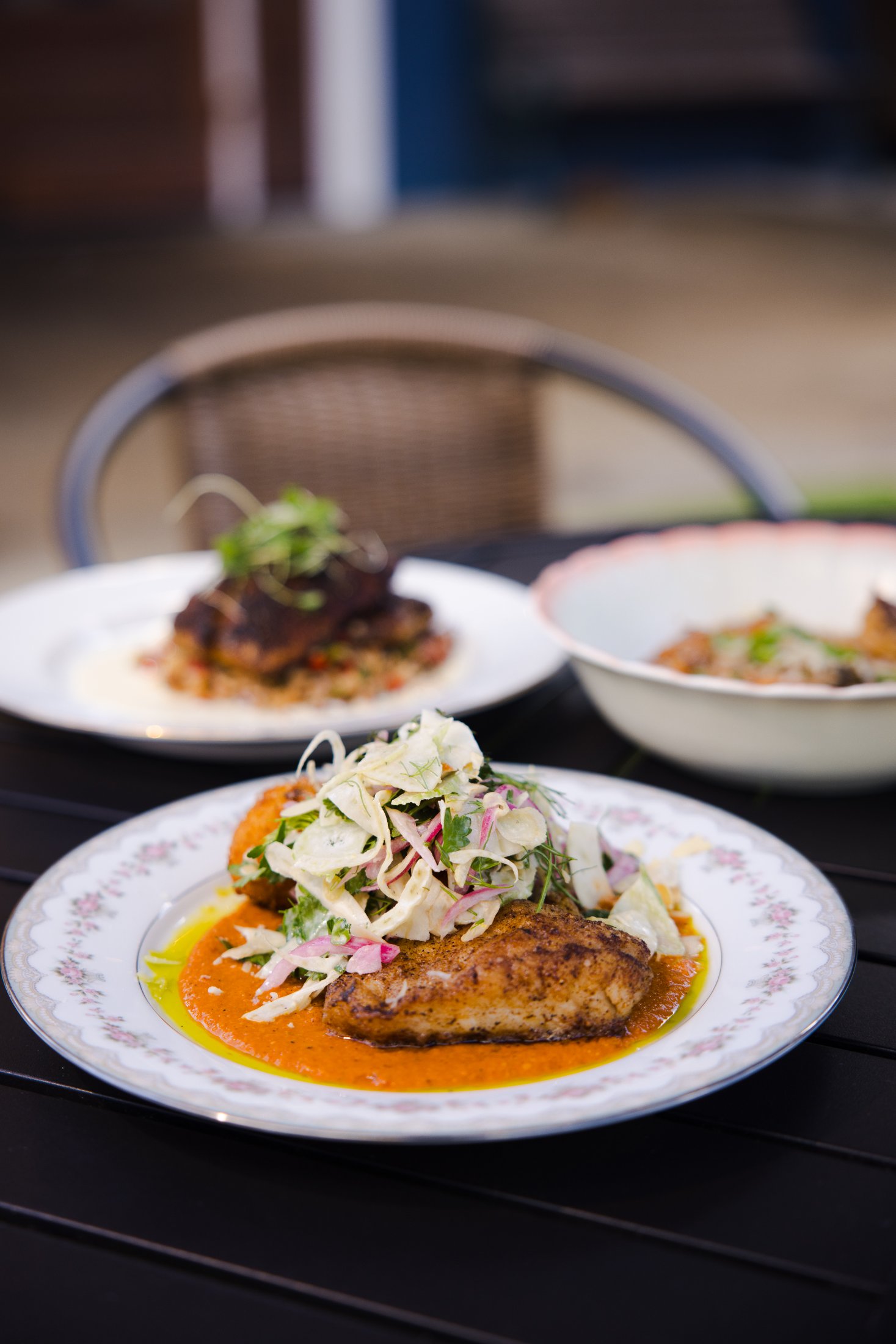 Blackened fish entrées plated on vintage china at The Tides Market — food photography by Orange Grove Social
